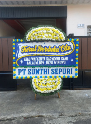Papan Bunga Duka di Kampung I Skip