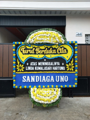 Papan Bunga Duka di Kampung I Skip